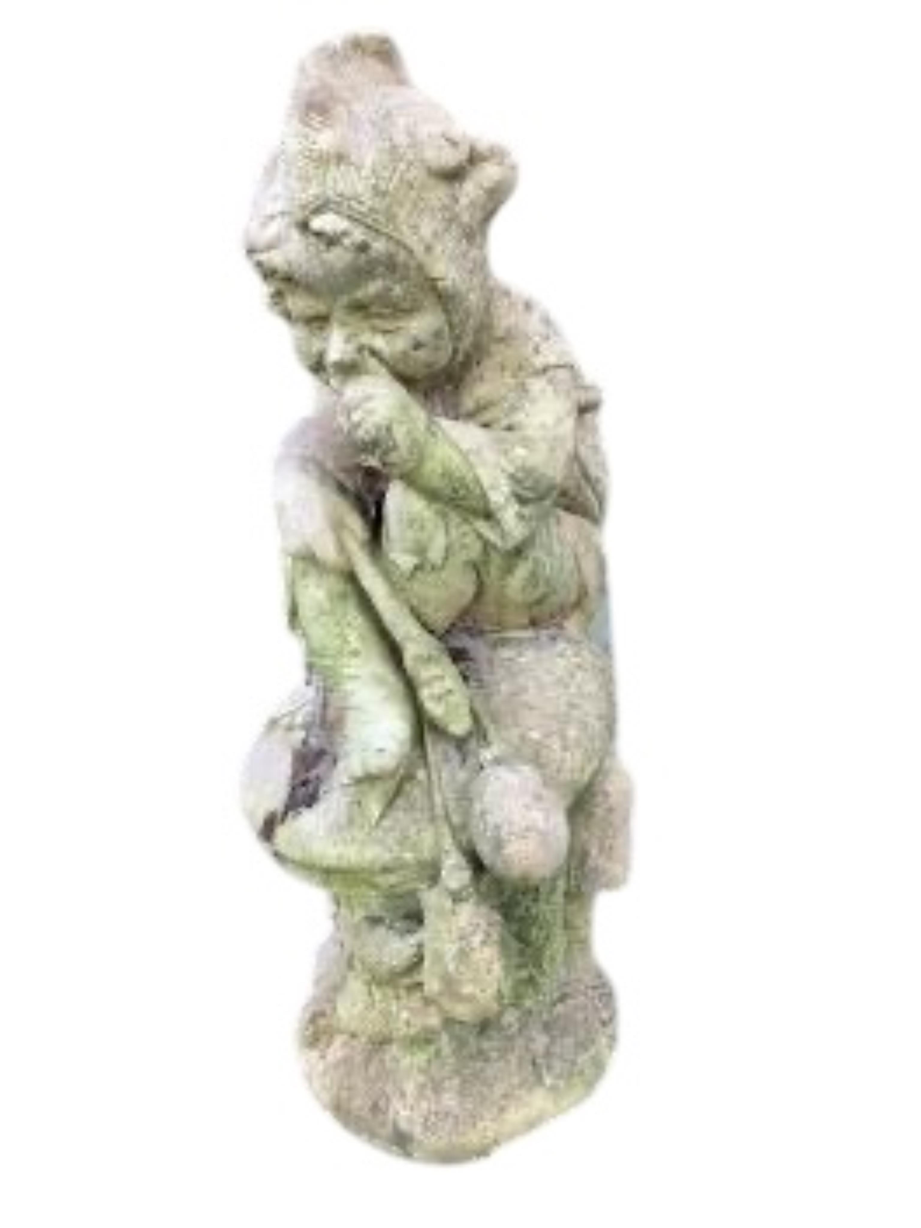A stone statue of an imp, height 69cm